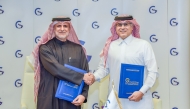 Founding Chairman of GORD Dr. Yousef bin Mohammed Alhorr and President of GSO Eng Nawaf bin Ibrahim Al Hamad Al Mana exchanging documents after signing the agreement.