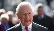 Britain's King Charles III meets well-wishers as he arrives with Britain's Queen Camilla to visit the Roe Valley Arts and Cultural Centre, in Limavady, on March 20, 2025, during a three-day trip to Northern Ireland. Photo by HENRY NICHOLLS / POOL / AFP