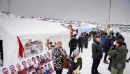 People stand in front of Godthaabshallen, where voting takes place in connection with the elections for the Greenlandic municipal councils, village councils, and parish representations in Nuuk, Greenland, on April 1, 2025. (Photo by Mads Claus Rasmussen / Ritzau Scanpix / AFP) 
