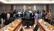 GU-Q students with officials during their visit to Indonesia.