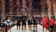 Men’s champions Arturo Coello and Agustin Tapia pose for a photo with women's title winners Gemma Triay Pons and Delfina Brea Sensei on the podium.