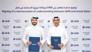 Invest Qatar CEO Sheikh Ali Alwaleed Al-Thani and QNB Group  CEO Abdulla Mubarak Al Khalifa during the agreement signing.