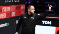 Mark Allen of Northern Ireland gestures to the crowd after the round 1 match against Fan Zhengyi of China at World Snooker Championship 2025 in Sheffield, Britain, April 21, 2025. (Photo by Zhai Zheng/Xinhua)
