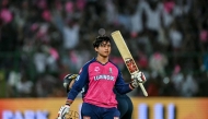 Rajasthan Royals' Vaibhav Suryavanshi celebrates after scoring a century (100 runs) during the Indian Premier League (IPL) Twenty20 cricket match in Jaipur on April 28, 2025. (Photo by Sajjad Hussain / AFP) 
