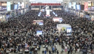 Passengers wait at the departure hall of Hongqiao Railway Station in east China's Shanghai on the first day of the May Day holiday, May 1, 2025. (Xinhua/Wang Xiang)