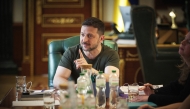 This handout photograph by Ukrainian presidential press-service taken on May 2, 2025 and released on May 3, 2025 shows Ukrainian president Volodymyr Zelensky (C) talking with journalists during a press conference in Kyiv. (Photo by Handout / UKRAINE PRESIDENCY / AFP)