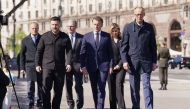 (From L) Poland's Prime Minister Donald Tusk, Ukraine's President Volodymyr Zelensky, Britain's Prime Minister Keir Starmer, France's President Emmanuel Macron, Olena Zelenska and Germany's Chancellor Friedrich Merz (Photo by Stefan Rousseau / POOL / AFP)