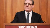 Britain's Prime Minister Keir Starmer delivers a speech during a press conference at the media briefing room of 9 Downing Street, central London, on May 12, 2025 ahead of the publication of the Government's Immigration White Paper. (Photo by Ian Vogler / POOL / AFP)
