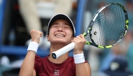 Alexandra Eala of the Philippines reacts at match point after defeating Iga Swiatek of Poland on Day 9 of the Miami Open at Hard Rock Stadium on March 26, 2025 in Miami Gardens, Florida. (Photo by Al Bello/Getty Images via AFP)

