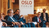 Minister of State at the Ministry of Foreign Affairs H E Dr. Mohammed bin Abdulaziz bin Saleh Al Khulaifi, Iran's Foreign Minister H E Abbas Araghchi (left) and others at a session at Oslo Forum. 