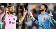 This combination of files pictures created on June 11, 2025 shows Inter Miami's Argentine forward Lionel Messi celebrating after scoring his team's third goal during the round of 32 Leagues Cup football match between Inter Miami CF and Orlando City SC at DRV PNK Stadium in Fort Lauderdale, Florida, on August 2, 2023, and Ahly's Egyptian goalkeeper #1 Mohamed el-Shenawy gesturing during the 2024 FIFA Intercontinental Cup football match between Mexico's Pachuca and Egypt's Al-Ahly at Stadium 974 in Doha on December 14, 2024. Al Ahly and Inter Miami will open the FIFA Club World Cup at the Hard Rock Stadium in Miami, Florida on June 14, 2025. (Photo by Chandan KHANNA and Karim JAAFAR / AFP)
