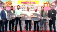 Safari officials with the mega promotion winners.