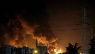 A fire blazes in the oil depots of Shahran, northwest of Tehran, on June 15, 2025. (Photo by Atta Kenare / AFP)