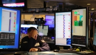 A trader is seen on the floor of the New York Stock Exchange in New York City, the United States. (Xinhua/Liu Yanan)