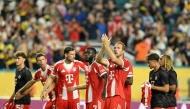 Bayern Munich's English forward #09 Harry Kane (R) and his teammates wave to the fans following the end of the match between Germany's Bayern Munich and Argentina's Boca Juniors in Miami on June 20, 2025. (Photo by Patricia De Melo Moreira / AFP)