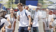 Red Bull Racing’s Dutch driver Max Verstappen is greeted by fans as he arrives at the Red Bull Ring race track in Spielberg, Austria, yesterday. 