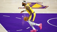 File: LeBron James of the Los Angeles Lakers handles the ball during the first half of a game against the Oklahoma City Thunder at Crypto.com Arena on February 07, 2023 in Los Angeles, California. (Photo by Ronald Martinez/Getty Images via AFP)