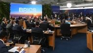 Brazil's President Luiz Inacio Lula da Silva (C) speaks during the first plenary session of the BRICS summit in Rio de Janeiro, Brazil, on July 6, 2025. (Photo by Mauro PIMENTEL / AFP)
