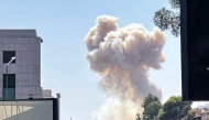 Smoke billows following Israeli strikes near the Syrian army and defence ministry headquarters in Damascus on July 16, 2025. (Photo by Rami al SAYED / AFP)