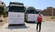 A QRCS official with some of the food aid.