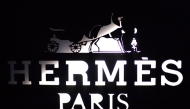 This photograph shows the logo of the French fashion main house and luxury goods Hermes outside a shop in the fashionable and luxurious street 