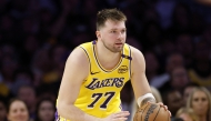 Luka Doncic #77 of the Los Angeles Lakers dribbles during a 103-96 loss to the Minnesota Timberwolves in Game Five of the Western Conference First Round NBA Playoffs at Crypto.com Arena on April 30, 2025 in Los Angeles, California. (Photo by Harry How / GETTY IMAGES NORTH AMERICA / AFP)
