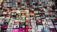 An array of small digital cameras on display in Hong Kong in August. Photo credit: Chris Velazco/The Washington Post
