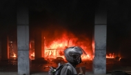 The West Nusa Tenggara Provincial Council office is seen on fire after it was stormed and looted during a demonstration in Mataram on Lombok Island, West Nusa Tenggara, on August 30, 2025. Photo by AFP.