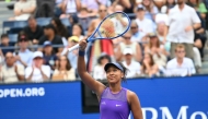 Japan's Naomi Osaka celebrates defeating USA's Coco Gauff during their women's singles round, on September 1, 2025. (Photo by ANGELA WEISS / AFP)