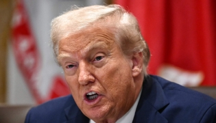 (Files) US President Donald Trump speaks during a cabinet meeting in the Cabinet Room of the White House in Washington, DC on August 26, 2025. (Photo by Mandel NGAN / AFP)  
