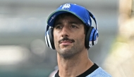 RB's Australian driver Daniel Ricciardo arrives for the drivers' parade before the Formula One Singapore Grand Prix night race at the Marina Bay Street Circuit in Singapore on September 22, 2024. (Photo by Lillian SUWANRUMPHA / AFP)

