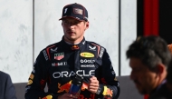 Red Bull Racing's Dutch driver Max Verstappen looks on after taking pole position following the qualifying session ahead of the Italian Formula One Grand Prix at the Autodromo Nazionale Monza circuit, in Monza, northern Italy, on September 6, 2025. (Photo by Philippe Lopez / AFP)