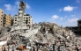 People search for salvage at the mound of rubble at the site of the collapsed Sussi Tower, which was destroyed earlier by Israeli bombardment, in Gaza City on September 6, 2025. (Photo by Omar Al-Qattaa / AFP)