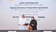 Senior Executive Vice President, QNB Group Corporate, Khalid Ahmed Al Sada with Director of Digital Innovation at MCIT, Eman Al Kuwari during the event.