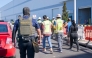 This handout photo released by US Immigration and Customs Enforcement (ICE) on September 5, 2025 allegedly shows a Homeland Security Investigations police officer during a federal search warrant at a company in Ellabell, Georgia, on September 4, 2025. (Photo by US Immigration and Customs Enforcement / AFP) 