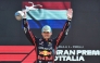 Red Bull Racing's Dutch driver Max Verstappen celebrates his victory on the podium after winning the Italian Formula One Grand Prix at the Autodromo Nazionale Monza circuit, in Monza, northern Italy, on September 7, 2025. (Photo by Marco Bertorello / AFP)