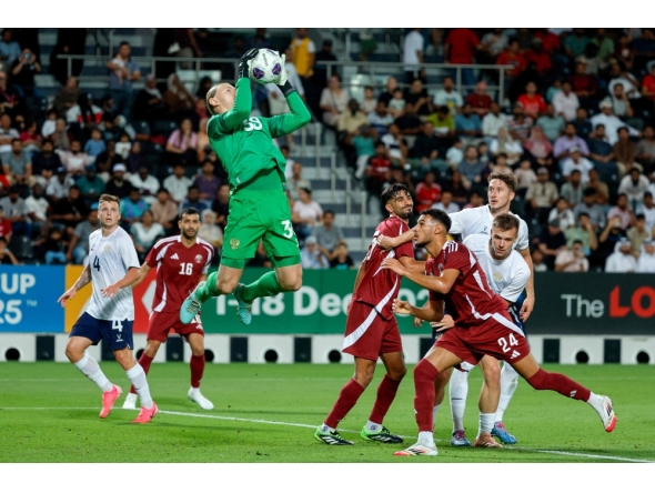 Russia's goalkeeper #39 Matvey Safonov secures the ball during the international friendly football match between Qatar and Russia at Jassim Bin Hamad Stadium in Doha on September 7, 2025 (Photo by Karim Jaafar / AFP)

