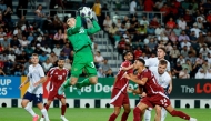 Russia's goalkeeper #39 Matvey Safonov secures the ball during the international friendly football match between Qatar and Russia at Jassim Bin Hamad Stadium in Doha on September 7, 2025 (Photo by Karim Jaafar / AFP)
