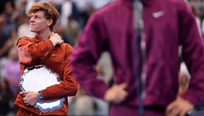 Jannik Sinner of Italy looks on as Carlos Alcaraz of Spain speaks following their Men's Singles Final match on Day Fifteen of the 2025 US Open at USTA Billie Jean King National Tennis Center on September 07, 2025 in New York City. Clive Brunskill/Getty Images/AFP
