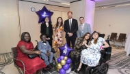 Britain's Prince Harry, Duke of Sussex, poses with previous WellChild award recipients (back L-R) Em Subinger, Evie Toombes and Dylan Bleach, and Ruky Anighoro (2L) with his mother Ufuoma, and Rhea Talwar (R) with her mother Purabi at the annual WellChild Awards in London on September 8, 2025. (Photo by Aaron Chown / POOL / AFP)