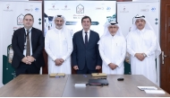 CEO of Dar Al Sharq Group, Abdul Latif Abdullah Al Mahmoud (second left) with CEO of DECC, Jose Vicente (centre), Deputy CEO of Dar Al Sharq Group and Editor-in-Chief of Al Sharq newspaper Jaber Al Harmi (second right) and other officials during the event.  Pics: Rajan Vadakkemuriyil/The Peninsula
