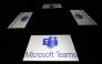 This photograph shows screens displaying the logo of Teams, a collaboration application developed by Microsoft, offering workspace chat and video conferencing, file storage, and integration of proprietary and third-party applications and services in Toulouse, southern France, on January 15, 2025. Photo by Lionel BONAVENTURE / AFP