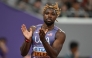 US sprinter Noah Lyles celebrates after competing in the men's 100m heats during the World Athletics Championships in Tokyo on September 13, 2025. (Photo by Andrej ISAKOVIC / AFP)