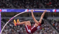 Qatar’s Seif Mohamed competes in the men's pole vault qualifying round.