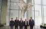 Officials pose for a group photo during the event.