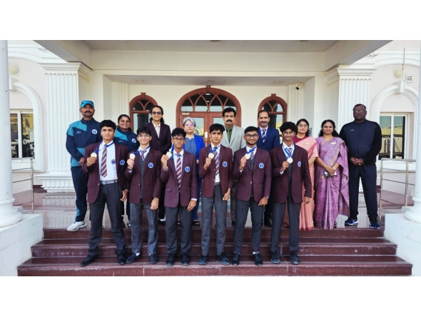Medal winners with school officials.
