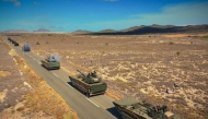 This handout picture released on September 18, 2025, by the CEOFANB (Strategic Operations Command of the Bolivarian National Armed Forces of Venezuela) shows a Venezuelan Navy VN16 tanks during military exercises on the Caribbean island of La Orchila, Venezuela. (Photo by Handout / CEOFANB / AFP)
