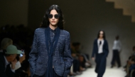 A model walks the runway during the Emporio Armani collection show at Milan's Fashion Week Womenswear Spring / Summer 2026, on September 25, 2025 in Milan. (Photo by Marco Bertorello / AFP)
