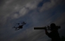 A soldier of the German armed forces Bundeswehr demonstrates the use of a handheld HP 47 drone jammer during a drone defence exercise in Hamburg, northern Germany, on September 26, 2025. (Photo by Tobias Schwarz / AFP)
