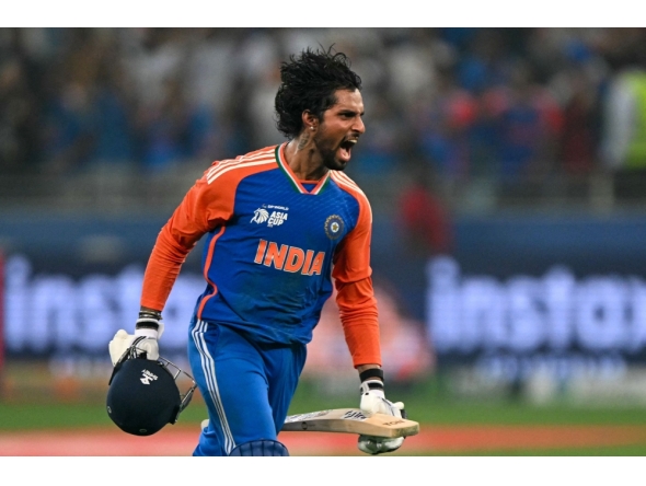 India's Tilak Varma celebrates their victory at the end of the Asia Cup 2025 Twenty20 international cricket final match between India and Pakistan at the Dubai International Stadium in Dubai on September 28, 2025. (Photo by Sajjad Hussain / AFP)